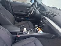 Gebraucht BMW 116 122 PS (89 kW) 2008 Schwarz Kleinwagen