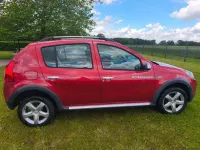 Gebraucht Dacia Sandero Stepway 84 PS (61 kW) 2012 Rot Limousine
