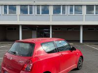 Second-hand Suzuki Swift 92 CP (67 kW) 2009 Roșu Hatchback