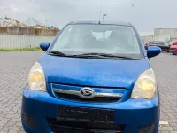 Gebraucht Daihatsu Cuore 69 PS (50 kW) 2009 Blau Kleinwagen