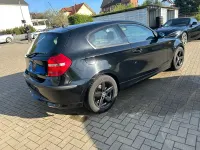 Käytetty BMW 116 122 HP (89 kW) 2007 Musta Viistoperä