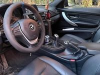 Second-hand BMW 318 143 CP (105 kW) 2013 Negru Berlinǎ