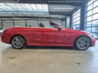 Gebraucht Mercedes C180 AMG 156 PS (114 kW) 2021 Hyazinthrot met. Cabrio