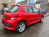 Gebraucht Peugeot 207 95 PS (69 kW) 2011 Rot Kleinwagen
