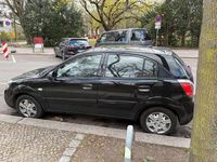 Second-hand Kia Rio 97 CP (71 kW) 2011 Negru Hatchback
