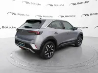 Gebraucht Opel Mokka Elegance 131 PS (96 kW) 2021 Kontrast grau/quarz silber SUV