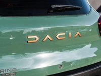 Gebraucht Dacia Spring Extreme 47 kW (65 PS) 2023 Oliv grau Kleinwagen