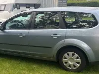 Käytetty Ford Focus Style 101 HP (74 kW) 2007 Harmaa Farmari