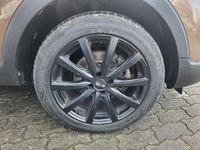 Gebraucht Renault Captur Intens 118 PS (86 kW) 2017 Braun metallic / dach beige SUV