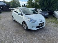 Gebraucht Mitsubishi Space Star 80 PS (58 kW) 2014 Weiß Kleinwagen