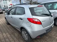Używany Mazda 2 Impuls 75 KM (55 kW) 2008 Srebrny Hatchback