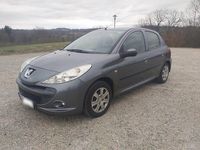 Gebraucht Peugeot 206+ 73 PS (53 kW) 2011 Grau Kleinwagen