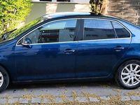 Second-hand VW Jetta 105 CP (77 kW) 2007 Albastru Berlinǎ