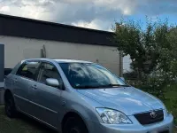 Używany Toyota Corolla 97 KM (71 kW) 2004 Srebrny Hatchback
