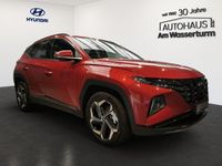 Gebraucht Hyundai Tucson Basis 265 PS (194 kW) 2023 Sunset red / mic (rot) SUV