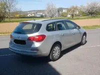 Second-hand Opel Astra 110 CP (80 kW) 2014 Argintiu Break