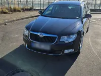 Używany Skoda Superb 170 KM (125 kW) 2012 Czarny Kombi