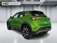 Gebraucht Opel Mokka Elegance 131 PS (96 kW) 2024 Lackierung matcha green/typ au SUV