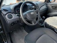 Gebraucht Hyundai i10 69 PS (50 kW) 2011 Schwarz Kleinwagen