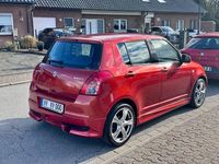 Gebraucht Suzuki Swift 92 PS (67 kW) 2008 Orange Kleinwagen