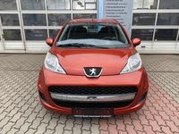 Gebraucht Peugeot 107 68 PS (50 kW) 2009 Orange Kleinwagen