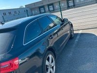 Second-hand Audi A6 250 CP (183 kW) 2012 Negru Break