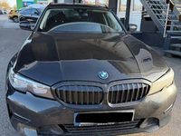 Gebraucht BMW 320e 163 PS (119 kW) 2022 Schwarz Kombi