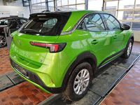 Gebraucht Opel Mokka-e Elegance 100 kW (136 PS) 2022 Matcha green/ikone gruen (metallic) SUV