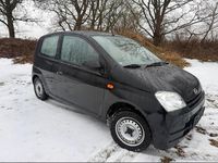 Gebraucht Daihatsu Cuore 59 PS (43 kW) 2006 Schwarz Kleinwagen