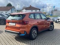 Używany BMW iX1 Performance 200 kW (272 KM) 2023 Pomarańczowy SUV