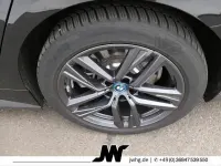 Gebraucht BMW i4 Sport Line 250 kW (340 PS) 2023 Black sapphire metallic Limousine