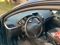 Gebraucht Peugeot 207 74 PS (54 kW) 2009 Schwarz Kleinwagen