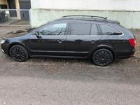 Gebraucht Skoda Superb 140 PS (102 kW) 2011 Schwarz Kombi