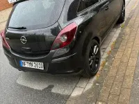 Używany Opel Corsa 90 KM (66 kW) 2009 Czarny Hatchback