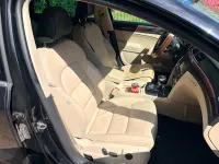 Używany Skoda Superb 163 KM (119 kW) 2011 Czarny Kombi