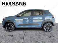 Gebraucht Dacia Spring Extreme 47 kW (65 PS) 2024 Schieferblau (blau) Kleinwagen