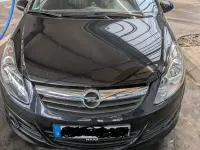Używany Opel Corsa 101 KM (74 kW) 2011 Czarny Hatchback
