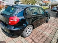 Second-hand BMW 116 122 CP (89 kW) 2010 Negru Hatchback