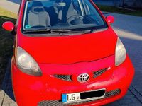 Gebraucht Toyota Aygo 68 PS (50 kW) 2007 Rot Kleinwagen