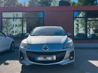 Second-hand Mazda 3 105 CP (77 kW) 2012 Argintiu Berlinǎ