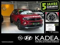 Gebraucht Opel Mokka-e Ultimate 100 kW (136 PS) 2023 Lackierung rot rubi/typ aussenverkleidun (metallic) SUV