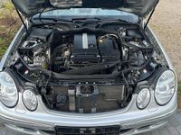 Second-hand Mercedes E200 163 CP (119 kW) 2003 Argintiu Berlinǎ