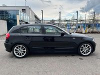 Gebraucht BMW 116 122 PS (89 kW) 2008 Schwarz Kleinwagen