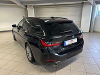 Gebraucht BMW 320e Performance 163 PS (119 kW) 2022 Schwarz Kombi