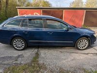Używany Skoda Superb 160 KM (117 kW) 2012 Niebieski Kombi