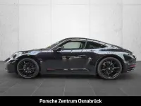 Gebraucht Porsche 911 Carrera 385 PS (283 kW) 2020 Tiefschwarzmetallic Coupé