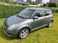 Używany Suzuki Swift 92 KM (67 kW) 2009 Szary Hatchback