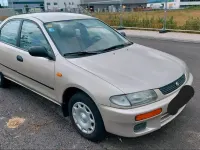 Gebraucht Mazda 323 Comfort 88 PS (64 kW) 1996 Beige Limousine