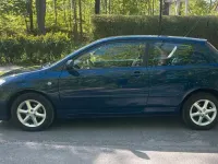 Używany Toyota Corolla 97 KM (71 kW) 2005 Niebieski Hatchback