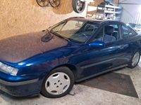 Second-hand Opel Calibra 150 CP (110 kW) 1992 Albastru Coupe